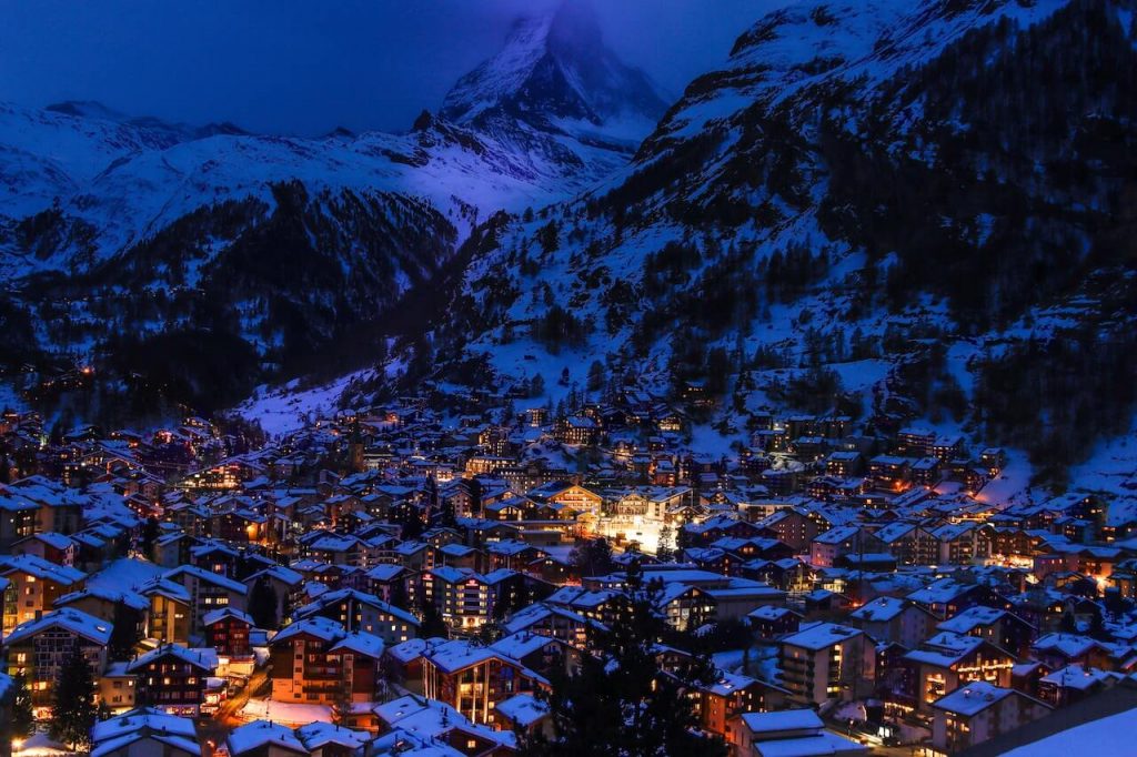 Zermatt, Switzerland, covered in a blanket of snow, creating a picturesque winter wonderland.